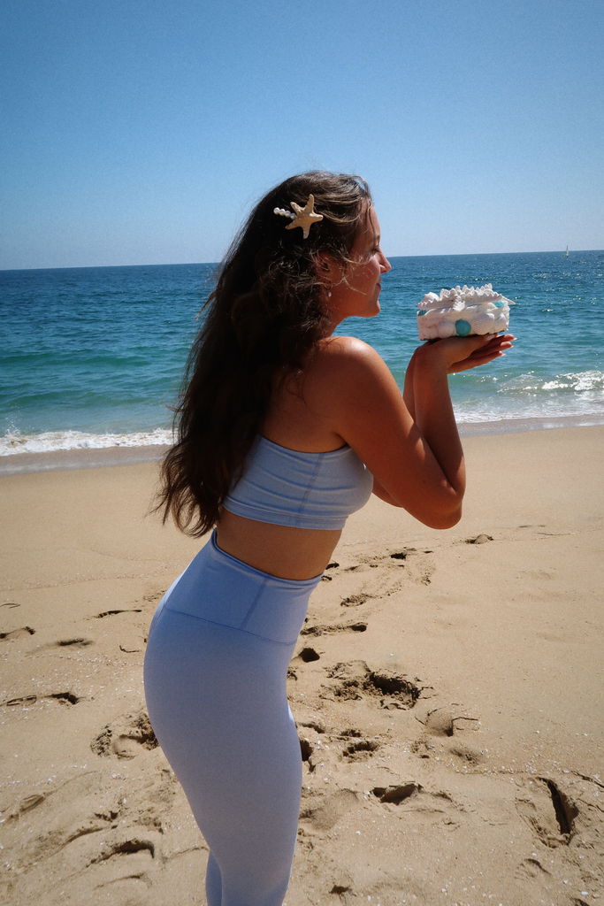 model standing on beach wearing Nixie Set